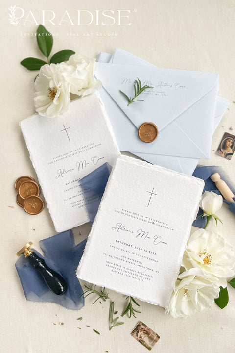 A timeless christening invitation crafted from luxurious handmade paper and designed to honor faith, family, and tradition. Featuring a delicate cross motif, refined typography, and soft blue accents, this invitation is perfect for baptisms and christenings held in church settings. An elegant keepsake that beautifully reflects the sacred meaning of the day.