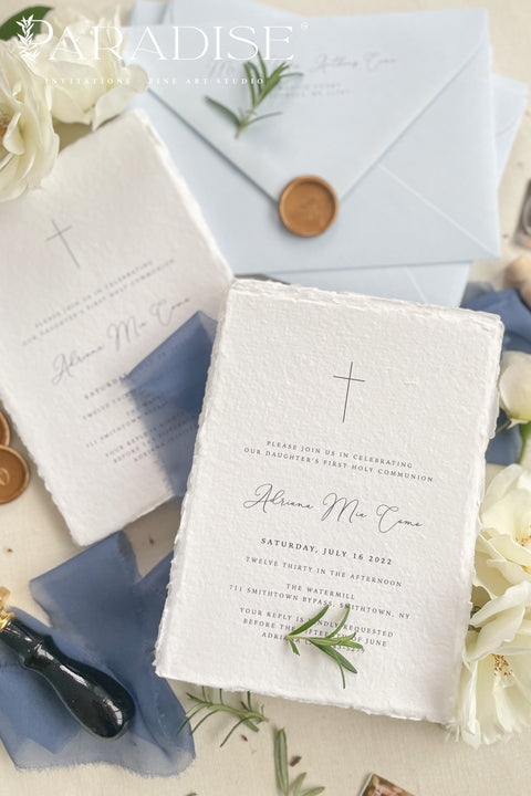 A timeless christening invitation crafted from luxurious handmade paper and designed to honor faith, family, and tradition. Featuring a delicate cross motif, refined typography, and soft blue accents, this invitation is perfect for baptisms and christenings held in church settings. An elegant keepsake that beautifully reflects the sacred meaning of the day.