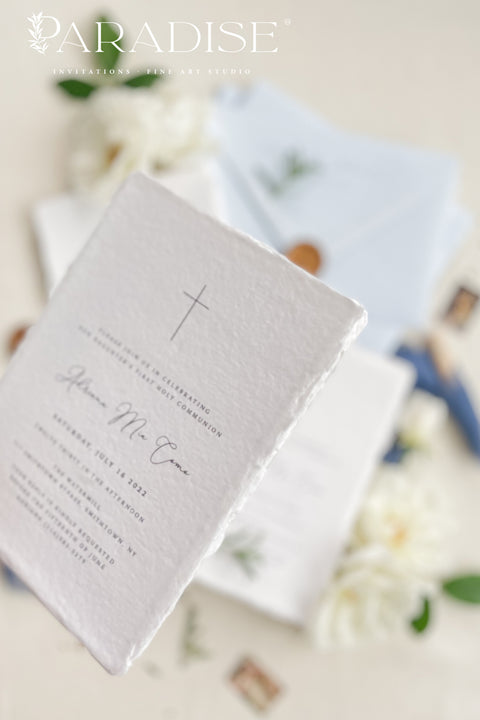 A timeless christening invitation crafted from luxurious handmade paper and designed to honor faith, family, and tradition. Featuring a delicate cross motif, refined typography, and soft blue accents, this invitation is perfect for baptisms and christenings held in church settings. An elegant keepsake that beautifully reflects the sacred meaning of the day.