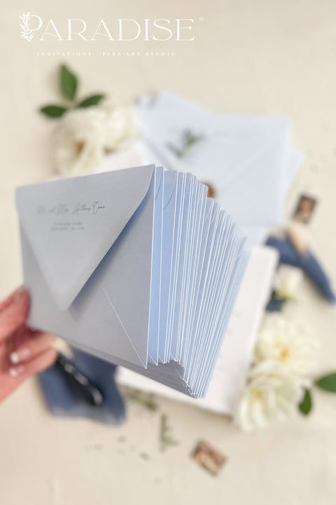 A timeless christening invitation crafted from luxurious handmade paper and designed to honor faith, family, and tradition. Featuring a delicate cross motif, refined typography, and soft blue accents, this invitation is perfect for baptisms and christenings held in church settings. An elegant keepsake that beautifully reflects the sacred meaning of the day.