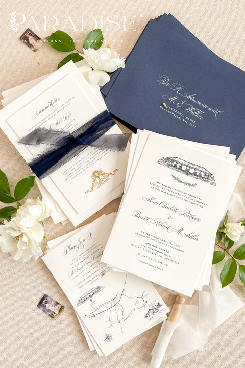 Elegant and refined, this letterpress wedding invitation suite brings classic artistry to modern romance. Featuring a custom hand-drawn illustration of your wedding venue, each piece is printed on luxurious cotton cardstock using the timeless technique of letterpress printing - creating a deep, tactile impression that you can both see and feel. The suite is accented with navy envelopes and tied with a silk ribbon, perfectly balancing sophistication with sentiment.