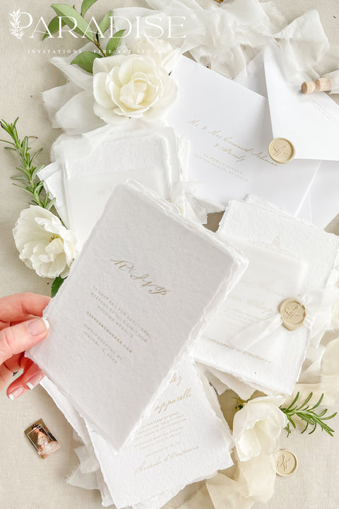 Announce your wedding with timeless elegance through our handmade deckled-edge wedding invitations, beautifully wrapped in vellum overlays, soft chiffon ribbons, and finished with custom gold wax seals. Each invitation is meticulously crafted by hand using luxury cotton paper, creating a textured, organic look that exudes romance and sophistication.