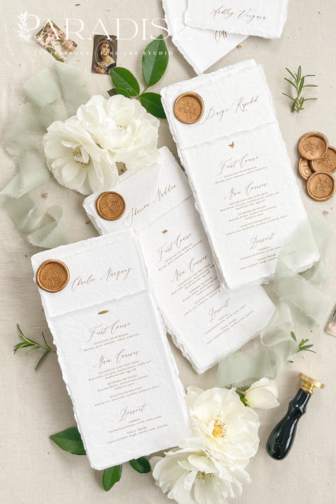 Capture timeless elegance with these handmade paper wedding menus, featuring classic deckled edges, refined calligraphy, and a luxurious gold wax seal. Each menu is handcrafted from 100% cotton rag paper, lending a rich texture and organic feel that instantly elevates any fine-art or romantic wedding aesthetic. Whether you’re hosting an intimate garden celebration, a formal black-tie dinner, or a destination wedding.