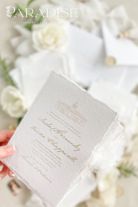 Announce your wedding with timeless elegance through our handmade deckled-edge wedding invitations, beautifully wrapped in vellum overlays, soft chiffon ribbons, and finished with custom gold wax seals. Each invitation is meticulously crafted by hand using luxury cotton paper, creating a textured, organic look that exudes romance and sophistication.