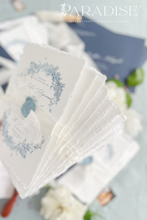 Set a sophisticated and thoughtful tone for your coastal celebration with these unique wedding invites. Perfect for a beach wedding, this suite features a classic navy theme with a beautifully designed wedding timeline to guide your guests through your special day. The elegant calligraphy design adds a touch of classic romance, while the eco-conscious materials ensure your stationery is a beautiful and responsible choice for your special day.