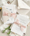 This handmade paper wedding invitation suite brings artistry and sentiment together. Each piece is printed on luxurious cotton paper with deckled edges, giving it a naturally soft and organic texture. The highlight of this suite is your custom hand-drawn map, created exclusively for your wedding to showcase your venue and key locations in elegant line art. Paired with blush silk ribbon, ivory envelopes, and a matching wax seal.
