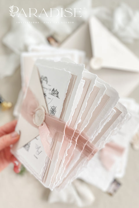 This handmade paper wedding invitation suite brings artistry and sentiment together. Each piece is printed on luxurious cotton paper with deckled edges, giving it a naturally soft and organic texture. The highlight of this suite is your custom hand-drawn map, created exclusively for your wedding to showcase your venue and key locations in elegant line art. Paired with blush silk ribbon, ivory envelopes, and a matching wax seal.