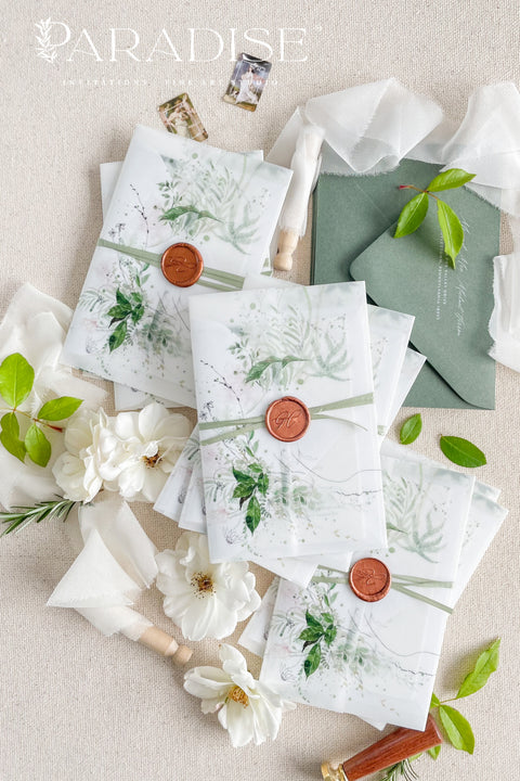 Bring the beauty of nature to your wedding day with our botanical vellum wedding invitation suite, designed for couples who adore timeless elegance with a modern organic touch. Each invitation is printed on luxury textured paper featuring soft watercolor greenery and wrapped in a translucent vellum cover, sealed with a warm wax seal for a romantic fine art finish.