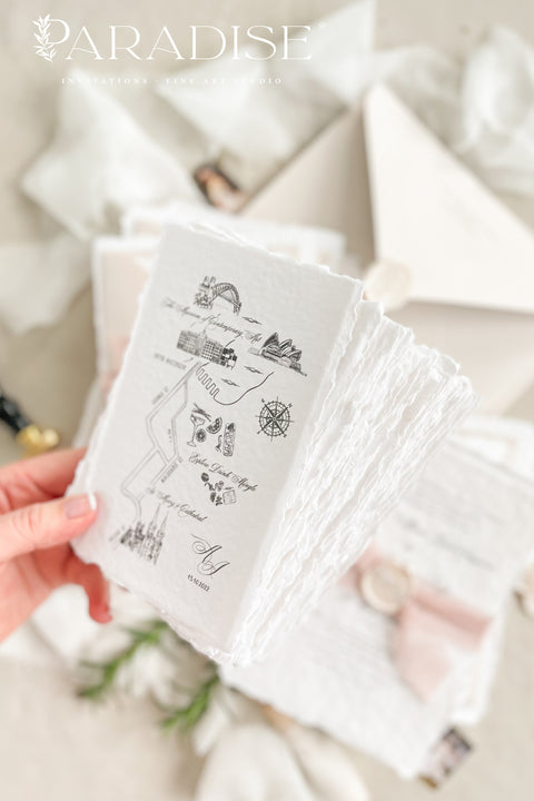 This handmade paper wedding invitation suite brings artistry and sentiment together. Each piece is printed on luxurious cotton paper with deckled edges, giving it a naturally soft and organic texture. The highlight of this suite is your custom hand-drawn map, created exclusively for your wedding to showcase your venue and key locations in elegant line art. Paired with blush silk ribbon, ivory envelopes, and a matching wax seal.