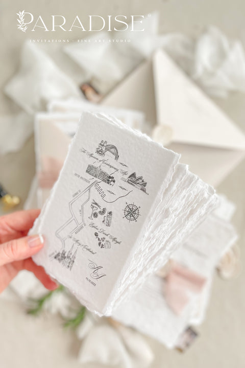 This handmade paper wedding invitation suite brings artistry and sentiment together. Each piece is printed on luxurious cotton paper with deckled edges, giving it a naturally soft and organic texture. The highlight of this suite is your custom hand-drawn map, created exclusively for your wedding to showcase your venue and key locations in elegant line art. Paired with blush silk ribbon, ivory envelopes, and a matching wax seal.