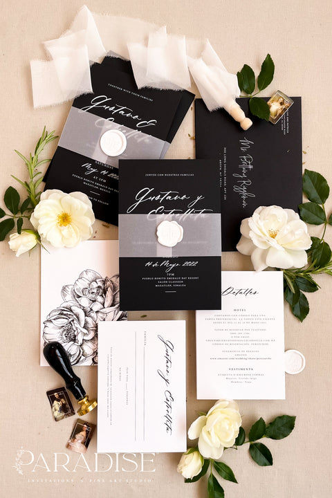 Sleek, elegant, and undeniably timeless - our black and white wedding invitation suite captures modern sophistication with a fine art twist. Printed on luxury matte cardstock, each invitation features crisp typography, vellum overlays, and a white wax seal for a touch of romance and refinement. Perfect for modern, black-tie, or minimalist weddings, this suite tells your story through contrast and craftsmanship - a beautiful reflection of contemporary love with classic undertones.