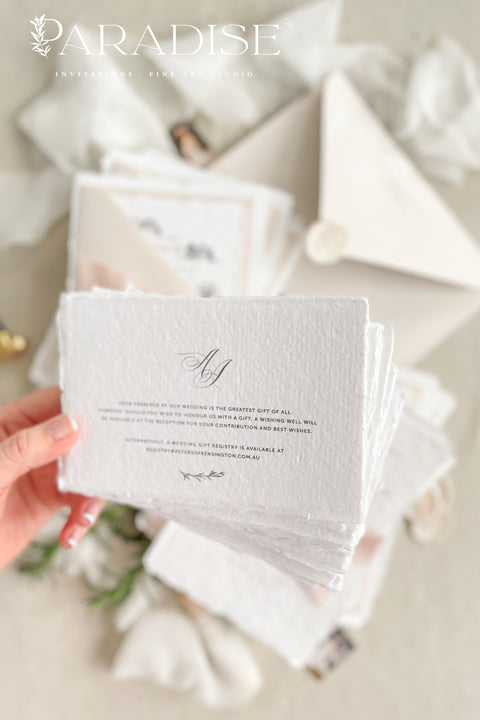 This handmade paper wedding invitation suite brings artistry and sentiment together. Each piece is printed on luxurious cotton paper with deckled edges, giving it a naturally soft and organic texture. The highlight of this suite is your custom hand-drawn map, created exclusively for your wedding to showcase your venue and key locations in elegant line art. Paired with blush silk ribbon, ivory envelopes, and a matching wax seal.