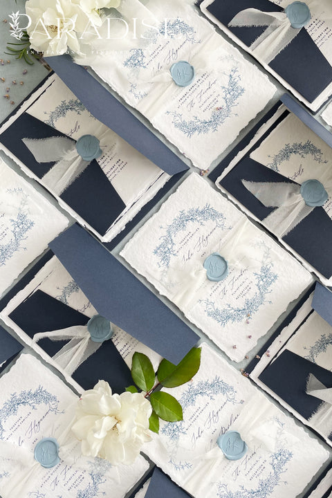 Set a sophisticated and thoughtful tone for your coastal celebration with these unique wedding invites. Perfect for a beach wedding, this suite features a classic navy theme with a beautifully designed wedding timeline to guide your guests through your special day. The elegant calligraphy design adds a touch of classic romance, while the eco-conscious materials ensure your stationery is a beautiful and responsible choice for your special day.