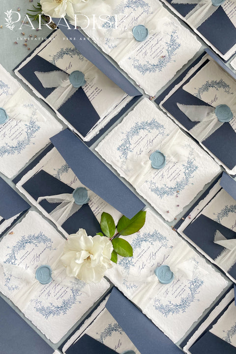 Set a sophisticated and thoughtful tone for your coastal celebration with these unique wedding invites. Perfect for a beach wedding, this suite features a classic navy theme with a beautifully designed wedding timeline to guide your guests through your special day. The elegant calligraphy design adds a touch of classic romance, while the eco-conscious materials ensure your stationery is a beautiful and responsible choice for your special day.