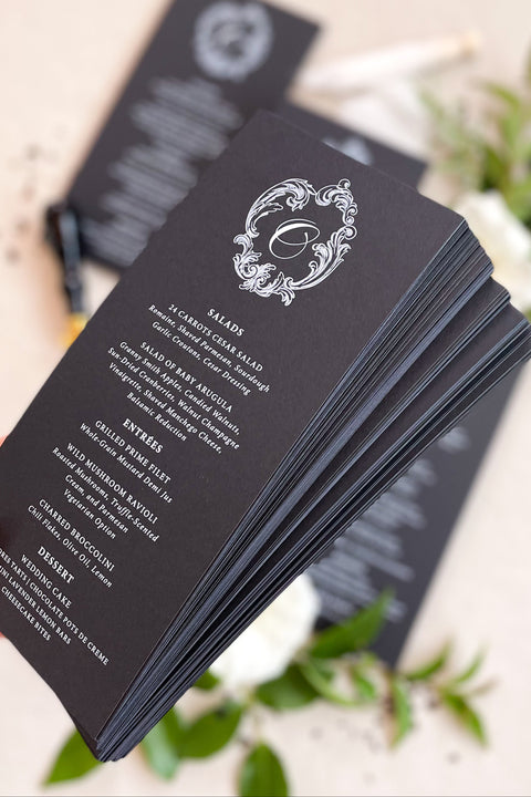 Make a bold and timeless impression with our black and white wedding menus, featuring a refined monogram design and exquisite typography. Crafted on luxury matte cardstock, each piece combines classic elegance with modern minimalism, making it ideal for black-tie weddings, luxury receptions, and sophisticated events. Designed for couples who appreciate fine art stationery, these menus bring harmony, contrast, and elevated refinement to every table setting.
