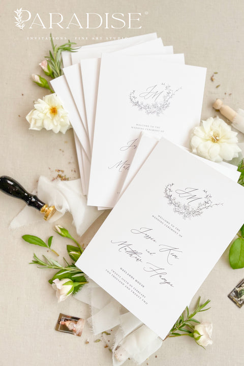 A refined, botanical-inspired wedding program designed for couples who love soft, fine-art elegance. Featuring a delicate floral monogram and graceful script typography, each program is printed on premium cardstock for a polished, timeless presentation. Perfect for romantic garden weddings, classic ceremonies, and celebrations with a natural, airy aesthetic.