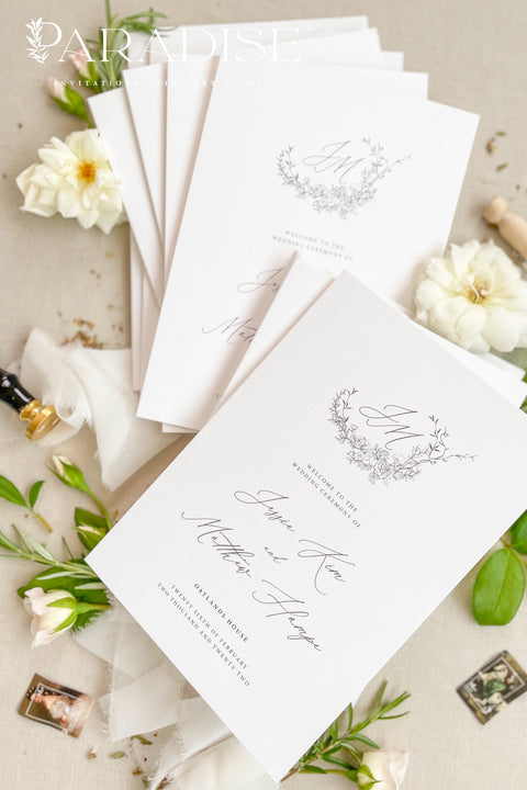A refined, botanical-inspired wedding program designed for couples who love soft, fine-art elegance. Featuring a delicate floral monogram and graceful script typography, each program is printed on premium cardstock for a polished, timeless presentation. Perfect for romantic garden weddings, classic ceremonies, and celebrations with a natural, airy aesthetic.