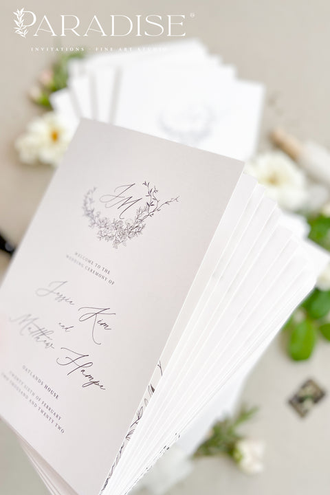 A refined, botanical-inspired wedding program designed for couples who love soft, fine-art elegance. Featuring a delicate floral monogram and graceful script typography, each program is printed on premium cardstock for a polished, timeless presentation. Perfect for romantic garden weddings, classic ceremonies, and celebrations with a natural, airy aesthetic.