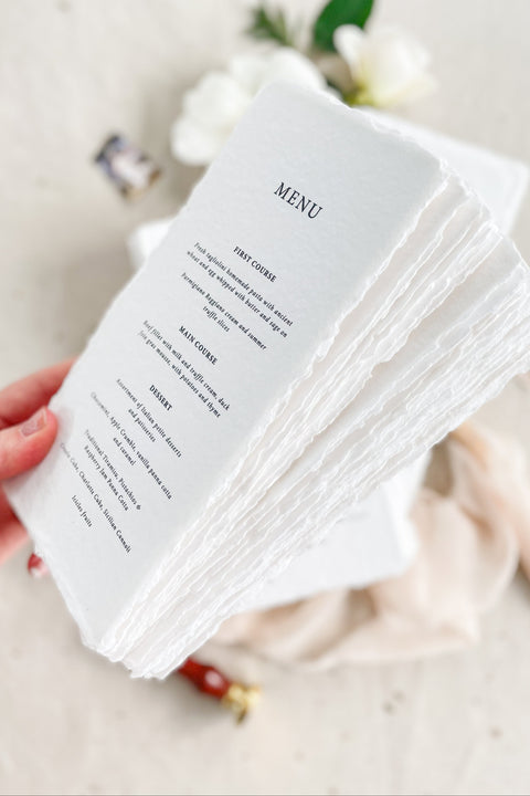 Bring a touch of understated elegance to your reception with our handmade paper wedding menus, designed for timeless beauty and artisanal charm. Each piece is crafted from luxury cotton rag paper with natural deckled edges and printed with fine typography that complements romantic, minimalist, or fine art wedding themes. Perfect for couples seeking authentic craftsmanship, these menus add texture, warmth, and sophistication to every place setting.