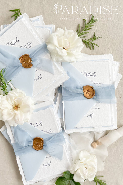 Announce your seaside celebration with these beautifully crafted handmade cotton paper wedding invitations. Perfect for a beach wedding, this suite combines a relaxed, coastal feel with the refined elegance of artisan paper. Each invitation is a true work of fine art, featuring a beautiful deckle edge and a timeless, romantic aesthetic that beautifully sets the tone for your special day.