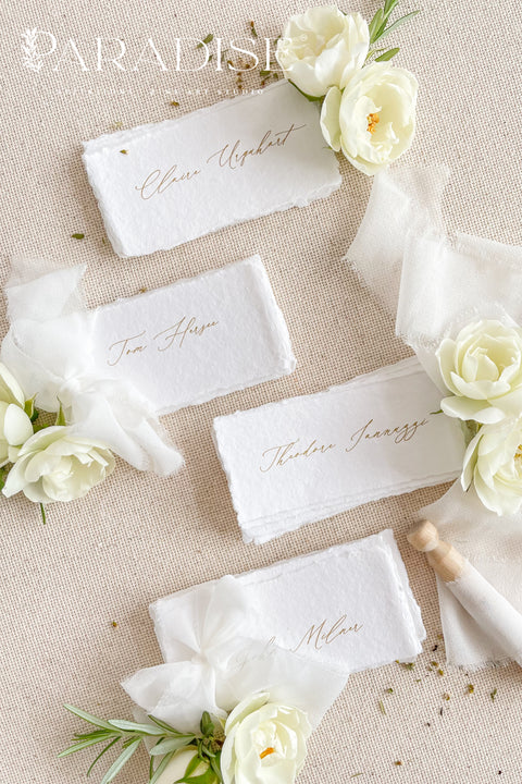 Create a romantic, fine-art tablescape with our handmade paper place cards, crafted from luxurious cotton rag paper and finished with soft, torn deckled edges. Each card features elegant calligraphy, delicate chiffon ribbon, and a timeless organic texture - perfect for weddings, intimate dinners, bridal showers, or upscale celebrations. These artisan-crafted pieces bring softness, refinement, and natural beauty to any seating display.