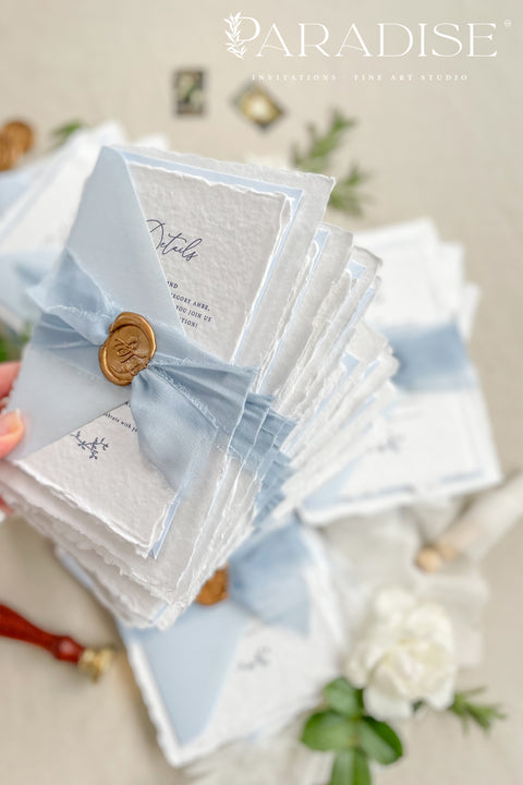 Announce your seaside celebration with these beautifully crafted handmade cotton paper wedding invitations. Perfect for a beach wedding, this suite combines a relaxed, coastal feel with the refined elegance of artisan paper. Each invitation is a true work of fine art, featuring a beautiful deckle edge and a timeless, romantic aesthetic that beautifully sets the tone for your special day.