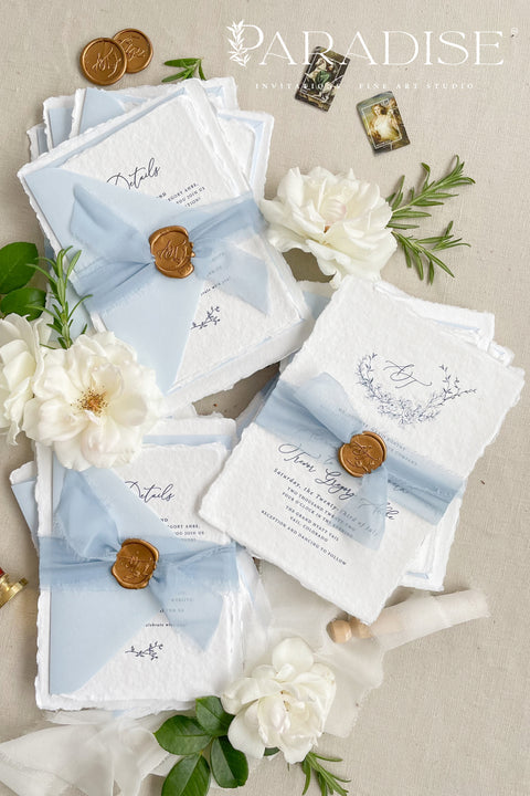 Announce your seaside celebration with these beautifully crafted handmade cotton paper wedding invitations. Perfect for a beach wedding, this suite combines a relaxed, coastal feel with the refined elegance of artisan paper. Each invitation is a true work of fine art, featuring a beautiful deckle edge and a timeless, romantic aesthetic that beautifully sets the tone for your special day.