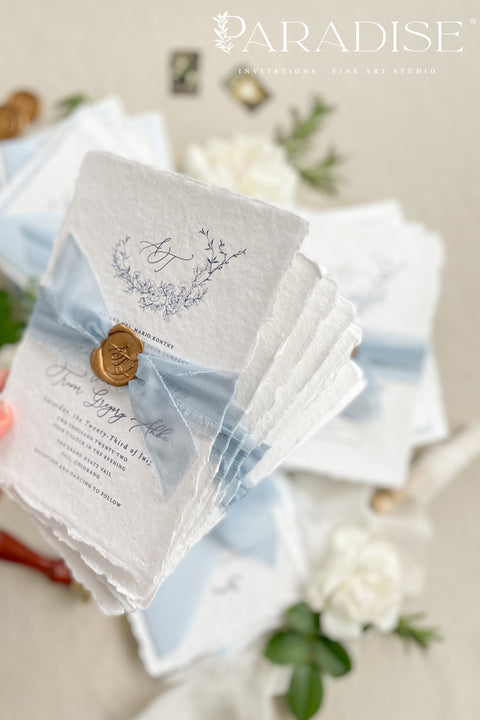 Announce your seaside celebration with these beautifully crafted handmade cotton paper wedding invitations. Perfect for a beach wedding, this suite combines a relaxed, coastal feel with the refined elegance of artisan paper. Each invitation is a true work of fine art, featuring a beautiful deckle edge and a timeless, romantic aesthetic that beautifully sets the tone for your special day.