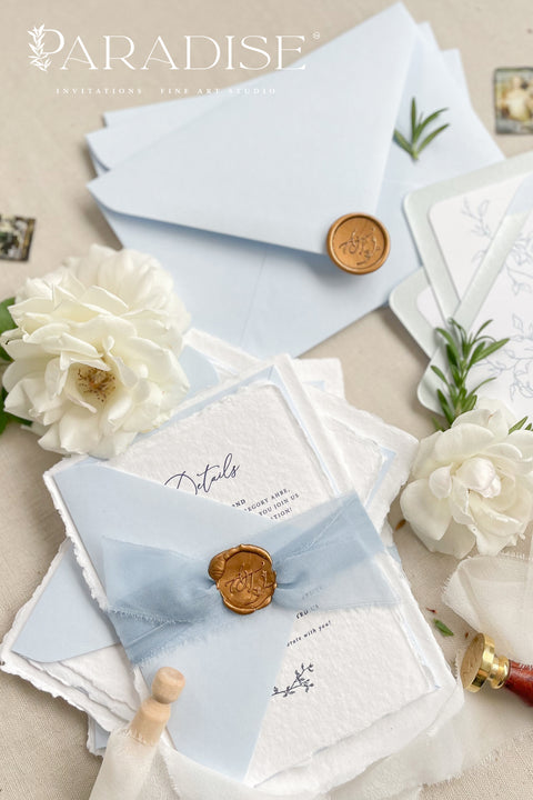 Announce your seaside celebration with these beautifully crafted handmade cotton paper wedding invitations. Perfect for a beach wedding, this suite combines a relaxed, coastal feel with the refined elegance of artisan paper. Each invitation is a true work of fine art, featuring a beautiful deckle edge and a timeless, romantic aesthetic that beautifully sets the tone for your special day.