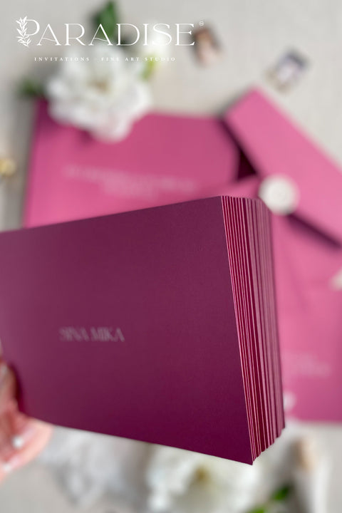 Plum wedding envelopes with professional address printing, crafted from premium paper and arranged to showcase rich color, smooth texture, and refined typography.