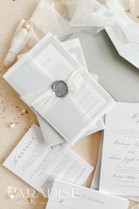 Announce your wedding in timeless style with our minimalist wedding invitations, wrapped in elegant vellum and finished with a silver wax seal. Each invitation is crafted by hand using premium textured paper, refined typography, and fine detailing - perfect for couples who love clean design and understated luxury. Ideal for modern, fine art, destination, or classic weddings.