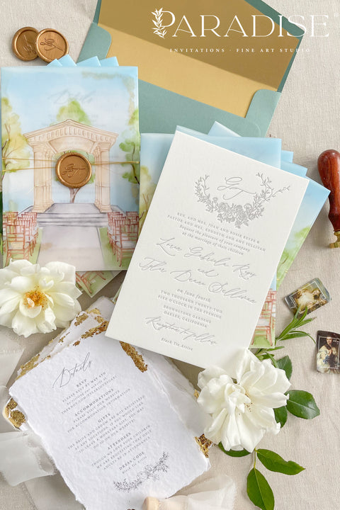 Announce your wedding with timeless artistry through this letterpress wedding invitation suite, featuring a custom watercolor vellum jacket that beautifully captures the romance of your venue. Each invitation is hand-pressed on luxury cotton paper, its deep letterpress impressions paired with soft deckled edges to evoke the elegance of fine art stationery. The suite is wrapped in a vellum overlay adorned with a watercolor venue illustration, sealed with a warm gold wax emblem.