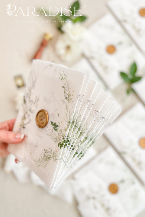 For couples who adore organic beauty and timeless detail, this handmade paper wedding invitation suite captures the essence of fine art stationery. The hand-drawn venue illustration is the centerpiece - a bespoke sketch that celebrates your love story and the place where it begins. Printed on thick, luxury cotton paper, its natural deckled edges and soft texture bring warmth and authenticity to every invitation. Wrapped in a floral vellum jacket and finished with a warm gold wax seal.