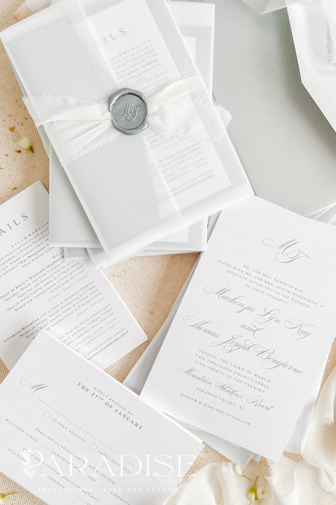 Announce your wedding in timeless style with our minimalist wedding invitations, wrapped in elegant vellum and finished with a silver wax seal. Each invitation is crafted by hand using premium textured paper, refined typography, and fine detailing - perfect for couples who love clean design and understated luxury. Ideal for modern, fine art, destination, or classic weddings.