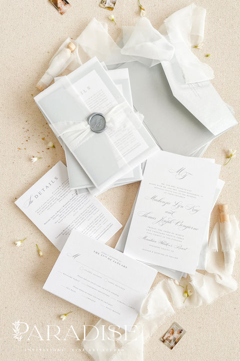 Announce your wedding in timeless style with our minimalist wedding invitations, wrapped in elegant vellum and finished with a silver wax seal. Each invitation is crafted by hand using premium textured paper, refined typography, and fine detailing - perfect for couples who love clean design and understated luxury. Ideal for modern, fine art, destination, or classic weddings.