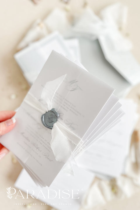 Announce your wedding in timeless style with our minimalist wedding invitations, wrapped in elegant vellum and finished with a silver wax seal. Each invitation is crafted by hand using premium textured paper, refined typography, and fine detailing - perfect for couples who love clean design and understated luxury. Ideal for modern, fine art, destination, or classic weddings.