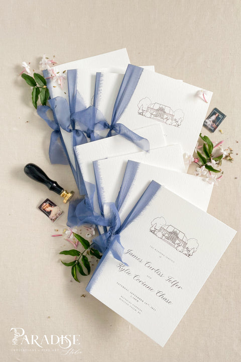 Hand-drawn venue artwork meets fine-art craftsmanship in these beautifully assembled wedding programs. The soft blue ribbon, textured cotton paper, and delicate illustration create an heirloom-quality piece that sets the tone for a romantic, detail-rich ceremony. Each program balances sophistication with warmth, offering guests a meaningful preview of your celebration.