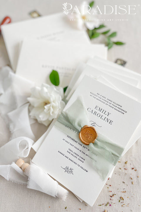 This letterpress wedding invitation suite is designed for couples who value craftsmanship and simplicity. Printed on luxury cotton paper, each invitation showcases the unmistakable texture and depth of traditional letterpress printing, where every word is gently pressed into the paper for a tactile, heirloom finish. Wrapped in a sage green silk ribbon and sealed with hand-poured gold wax, this suite exudes quiet luxury and romance.