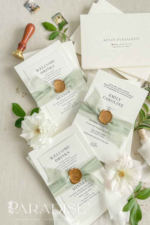 This letterpress wedding invitation suite is designed for couples who value craftsmanship and simplicity. Printed on luxury cotton paper, each invitation showcases the unmistakable texture and depth of traditional letterpress printing, where every word is gently pressed into the paper for a tactile, heirloom finish. Wrapped in a sage green silk ribbon and sealed with hand-poured gold wax, this suite exudes quiet luxury and romance.