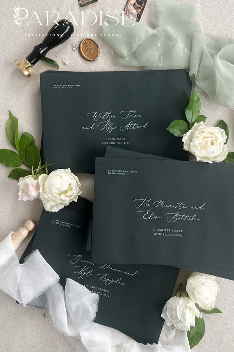 Green wedding envelopes with professional address printing, crafted from premium paper and styled to showcase rich color, smooth texture, and refined typography.