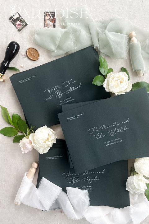Green wedding envelopes with professional address printing, crafted from premium paper and styled to showcase rich color, smooth texture, and refined typography.