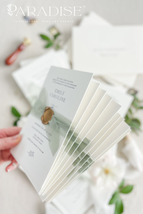 This letterpress wedding invitation suite is designed for couples who value craftsmanship and simplicity. Printed on luxury cotton paper, each invitation showcases the unmistakable texture and depth of traditional letterpress printing, where every word is gently pressed into the paper for a tactile, heirloom finish. Wrapped in a sage green silk ribbon and sealed with hand-poured gold wax, this suite exudes quiet luxury and romance.