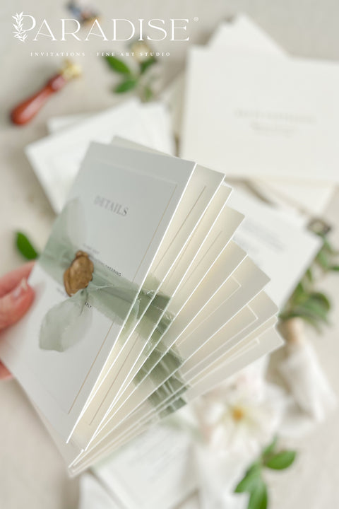 This letterpress wedding invitation suite is designed for couples who value craftsmanship and simplicity. Printed on luxury cotton paper, each invitation showcases the unmistakable texture and depth of traditional letterpress printing, where every word is gently pressed into the paper for a tactile, heirloom finish. Wrapped in a sage green silk ribbon and sealed with hand-poured gold wax, this suite exudes quiet luxury and romance.