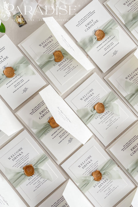This letterpress wedding invitation suite is designed for couples who value craftsmanship and simplicity. Printed on luxury cotton paper, each invitation showcases the unmistakable texture and depth of traditional letterpress printing, where every word is gently pressed into the paper for a tactile, heirloom finish. Wrapped in a sage green silk ribbon and sealed with hand-poured gold wax, this suite exudes quiet luxury and romance.