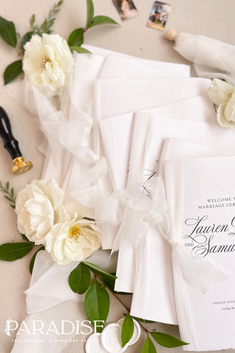Bring timeless elegance to your ceremony with this classic wedding program, printed on premium white cardstock and finished with soft chiffon ribbon. The refined script typography and clean layout create an elevated fine-art feel - perfect for romantic, traditional, and modern-classic weddings. A beautiful keepsake your guests will cherish.