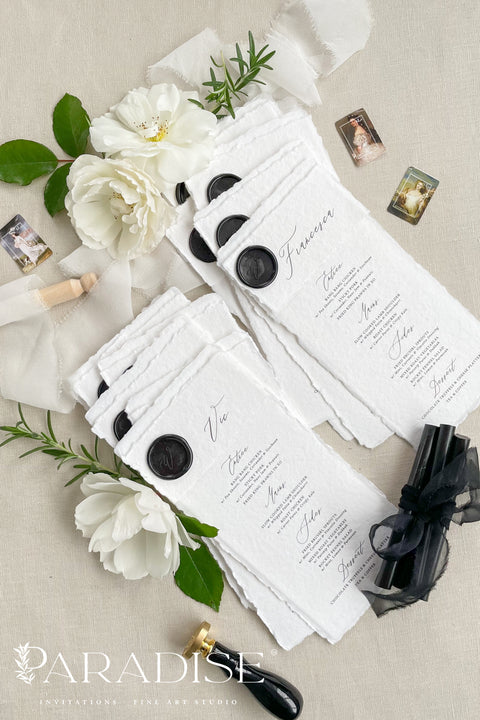 Add a touch of timeless sophistication to your wedding table with our handmade paper menus, sealed with a luxurious black wax emblem. Crafted on deckled-edge cotton rag paper, these menus embody fine art elegance and artisanal craftsmanship - a perfect balance of simplicity and grandeur. Ideal for romantic, modern, or classic weddings, each menu is hand-finished for a refined aesthetic that leaves a lasting impression on your guests.