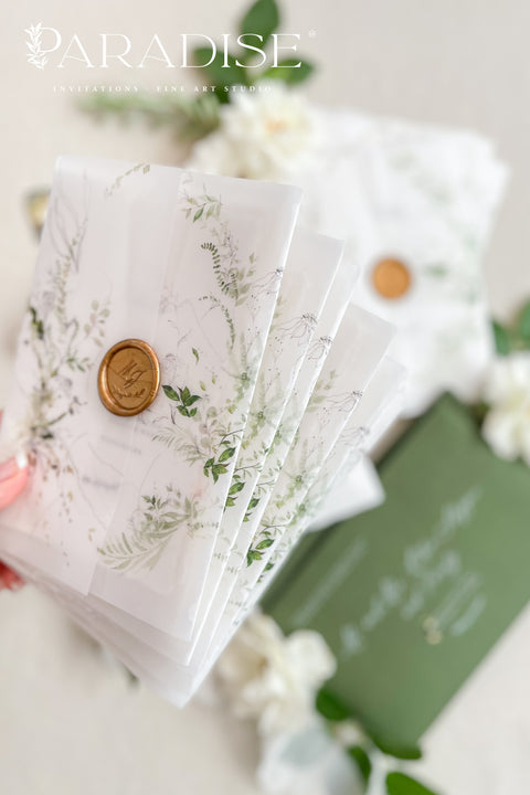 For couples who adore organic beauty and timeless detail, this handmade paper wedding invitation suite captures the essence of fine art stationery. The hand-drawn venue illustration is the centerpiece - a bespoke sketch that celebrates your love story and the place where it begins. Printed on thick, luxury cotton paper, its natural deckled edges and soft texture bring warmth and authenticity to every invitation. Wrapped in a floral vellum jacket and finished with a warm gold wax seal.