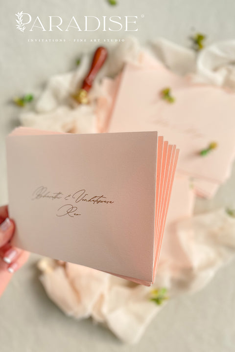 Blush wedding envelopes with professional address printing, crafted from premium paper and arranged to show soft color, smooth texture, and refined typography.