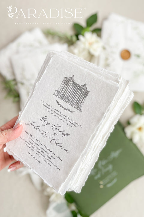 For couples who adore organic beauty and timeless detail, this handmade paper wedding invitation suite captures the essence of fine art stationery. The hand-drawn venue illustration is the centerpiece - a bespoke sketch that celebrates your love story and the place where it begins. Printed on thick, luxury cotton paper, its natural deckled edges and soft texture bring warmth and authenticity to every invitation. Wrapped in a floral vellum jacket and finished with a warm gold wax seal.