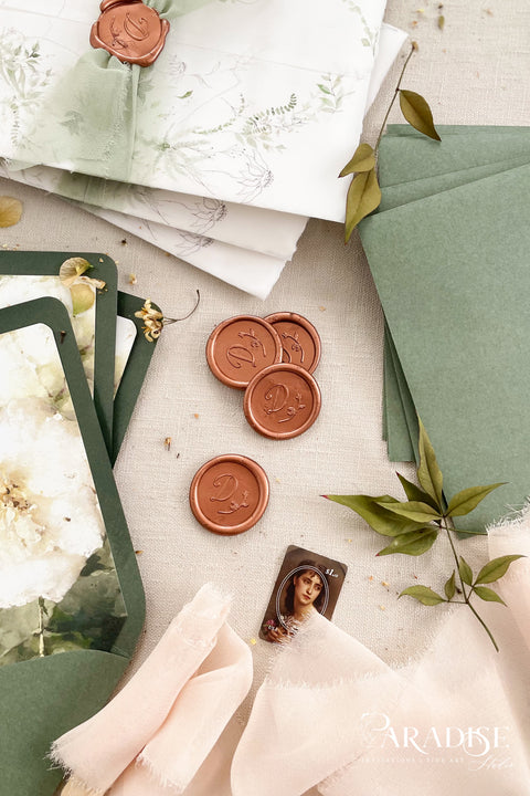 Warm, rich copper wax seals bring depth and understated luxury to wedding stationery, envelopes, and keepsake details. Hand-poured and finished with a softly metallic sheen, each seal adds a timeless accent that pairs beautifully with handmade paper, vellum, and fine art envelopes. Perfect for couples seeking an elegant, organic finishing touch with a classic feel.